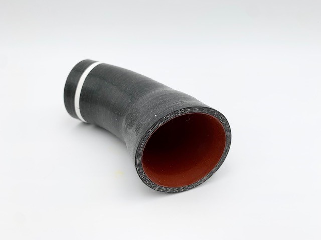 Outlet hose with FVMQ liner